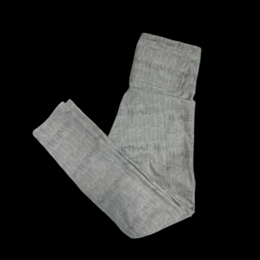 Grey/white‎ patterned workout pants with side pockets